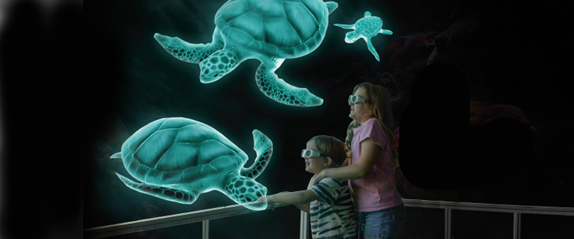 Image of kids viewing holographic sea turtles